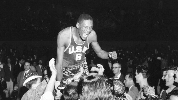 RUSSELL 1956-cchamps-russell-lifted-up-by-usf-fans