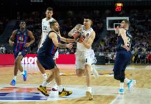 En tiempo extra, Real Madrid superó al Barcelona Gaby Deck ataca a Nico Laprovittola en el derby español por Euroliga.