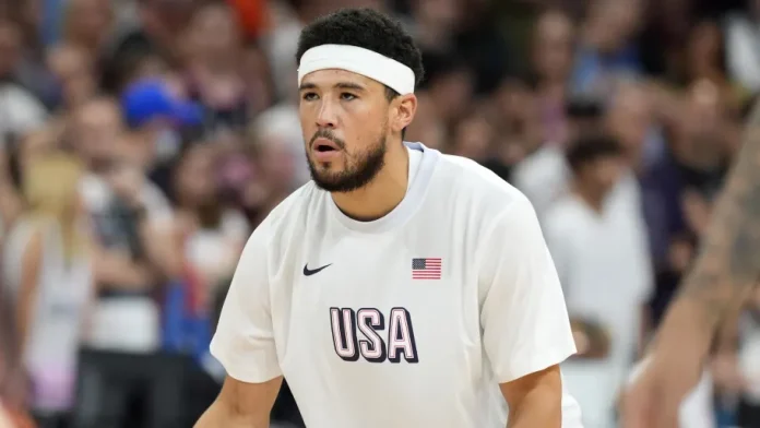 devin-booker-usa-fiba Devin Booker fue campeón olímpico en Tokio 2020.