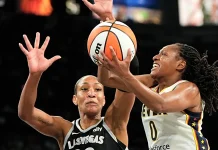 Fever y Lynx se quedaron con los primeros juegos de las semifinales Kelsey Mitchell lanza al aro ante la defensa de A'Ja Wilson.