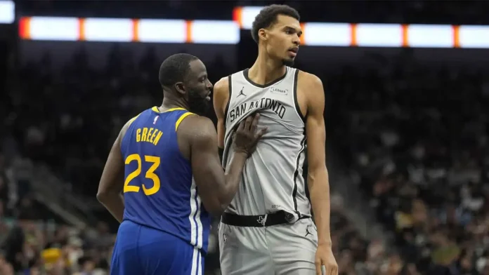 Wembanyama choca con Draymond Green.